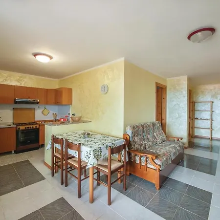 Apartment In Porto Alabe With Kitchen Magomadas